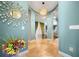 Elegant entryway with high ceilings and a chandelier at 9406 Dugard Ct, Orlando, FL 32827