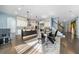 Spacious kitchen with island, stainless steel appliances, and white cabinets at 9406 Dugard Ct, Orlando, FL 32827