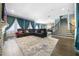 Open living space featuring hardwood floors, fireplace, and ample natural light at 9406 Dugard Ct, Orlando, FL 32827