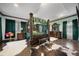Luxurious main bedroom with a large four poster bed and dark wood furniture at 9406 Dugard Ct, Orlando, FL 32827