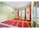 Serene prayer room with red carpet and natural light at 9406 Dugard Ct, Orlando, FL 32827