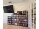 Home media room with large TV and extensive movie collection at 4995 County Road 121D, Wildwood, FL 34785