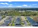 Aerial view of the neighborhood, showcasing homes with solar panels at 524 Scenic Bluff Blvd, Lake Wales, FL 33853