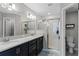 Double vanity bathroom with a walk-in shower at 524 Scenic Bluff Blvd, Lake Wales, FL 33853