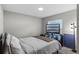 Comfortable bedroom with a full-size bed and TV at 524 Scenic Bluff Blvd, Lake Wales, FL 33853