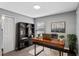 Home office with large desk, bookcase, and window at 524 Scenic Bluff Blvd, Lake Wales, FL 33853