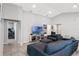 Spacious living room with sectional sofa and large TV at 524 Scenic Bluff Blvd, Lake Wales, FL 33853