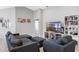 Bright living room featuring a sectional sofa and built-in shelving at 524 Scenic Bluff Blvd, Lake Wales, FL 33853