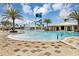 Resort-style pool with water features, lounge chairs, and clubhouse at 1925 Blissful Dr, Kissimmee, FL 34744