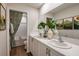Double vanity bathroom with a shower and bathtub at 3848 King Hill Dr, Haines City, FL 33844