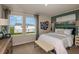 Cozy bedroom with a queen-size bed and calming decor at 3848 King Hill Dr, Haines City, FL 33844
