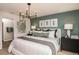 Main bedroom with king-size bed, and en-suite bathroom access at 3848 King Hill Dr, Haines City, FL 33844