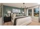 Spacious main bedroom with a large bed and stylish decor at 3848 King Hill Dr, Haines City, FL 33844