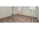 Comfortable bedroom with carpet flooring and two windows at 1781 Frogmore Ave, Haines City, FL 33844