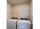 Laundry room with Whirlpool washer and dryer at 4002 Gardenia Ave, Lake Hamilton, FL 33851