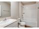 Clean bathroom with a shower/tub combo and updated vanity at 4010 Gardenia Ave, Lake Hamilton, FL 33851