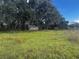 Small wooden shed in a grassy field at 1684 Se 44Th Pl, Bushnell, FL 33513