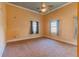 Spacious bedroom with neutral walls and carpeted floors at 514 W Hancock St, Lakeland, FL 33803