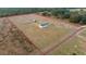 Aerial view showing home and large property at 7435 Postal Colony Rd, Clermont, FL 34714