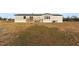 Back of the mobile home with deck at 7435 Postal Colony Rd, Clermont, FL 34714
