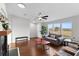 Living room with wood floors, fireplace and large windows at 7435 Postal Colony Rd, Clermont, FL 34714