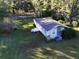 Aerial view of a ranch home and yard at 4805 Sand Mountain Loop Rd, Auburndale, FL 33823
