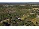 Aerial view of property and surrounding landscape at 4805 Sand Mountain Loop Rd, Auburndale, FL 33823