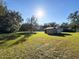 Large backyard with shed and plenty of sunlight at 4805 Sand Mountain Loop Rd, Auburndale, FL 33823