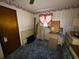 Bedroom with dresser, TV, and blue carpet at 4805 Sand Mountain Loop Rd, Auburndale, FL 33823