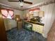 Bedroom with two dressers, lamps, and blue carpet at 4805 Sand Mountain Loop Rd, Auburndale, FL 33823