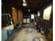 Attached garage with washer, dryer, and ample storage at 4805 Sand Mountain Loop Rd, Auburndale, FL 33823