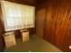 Small spare room with wood paneling and large window at 4805 Sand Mountain Loop Rd, Auburndale, FL 33823