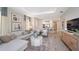 Open-concept living area with views into the kitchen at 5340 Spoonflower Ct, St Cloud, FL 34771
