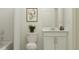 Simple bathroom featuring a white vanity and bathtub at 1287 Blue Ash Ln, Deland, FL 32720