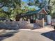 Charming log cabin with stone steps and landscaping at 25232 Ne 142Nd St, Fort Mc Coy, FL 32134