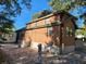 Log cabin home with large windows and stone wall at 25232 Ne 142Nd St, Fort Mc Coy, FL 32134