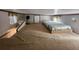 Spacious loft bedroom with twin bed and carpeting at 25232 Ne 142Nd St, Fort Mc Coy, FL 32134