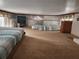 Loft with two beds and a TV at 25232 Ne 142Nd St, Fort Mc Coy, FL 32134
