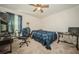 Cozy bedroom with a desk and window at 2807 Polson Dr, Kissimmee, FL 34758