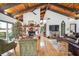 Festive living room with Christmas decorations, fireplace, and wood ceiling at 1212 Lake Point Dr, Lakeland, FL 33813