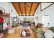 Inviting living room with wood floors, vaulted ceilings, and a cozy fireplace at 1212 Lake Point Dr, Lakeland, FL 33813