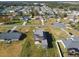 Aerial view of a new home under construction in a residential neighborhood at 3225 Parkwood Ct, Kissimmee, FL 34744