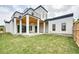 Modern home with covered patio and fenced backyard at 3225 Parkwood Ct, Kissimmee, FL 34744