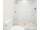 Modern bathroom with marble shower and tile floor at 3225 Parkwood Ct, Kissimmee, FL 34744