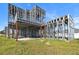 Metal frame of a two-story house under construction at 3225 Parkwood Ct, Kissimmee, FL 34744