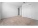 Well-lit bedroom with neutral carpeting and double door closet at 2162 Hadley Rd, Bartow, FL 33830