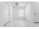 Foyer with marble-look tile flooring and a window at 2162 Hadley Rd, Bartow, FL 33830