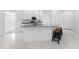 Kitchen island with granite countertop and four barstools at 2162 Hadley Rd, Bartow, FL 33830