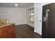 Kitchen with granite countertops and dark wood cabinets at 1051 Woodlark Dr, Haines City, FL 33844