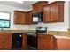 Kitchen with granite countertops and stainless steel appliances at 1051 Woodlark Dr, Haines City, FL 33844